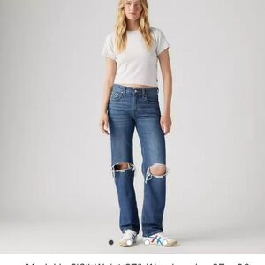 Dark wash Levi’s low pro jeans